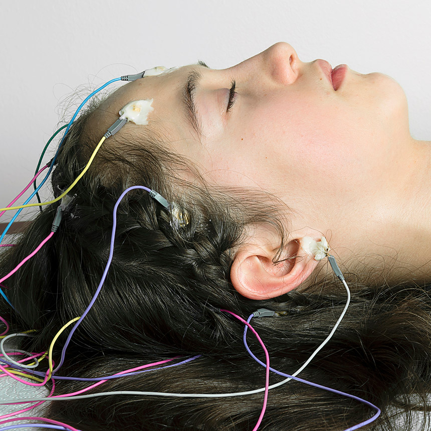 Sleeping woman with electrodes